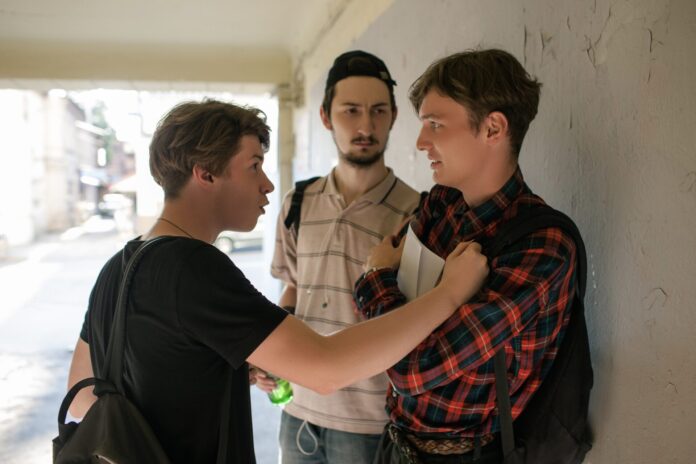 teenage violence scared boy street thugs